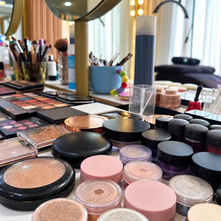 Makeup palettes and powders on the salon makeup counter